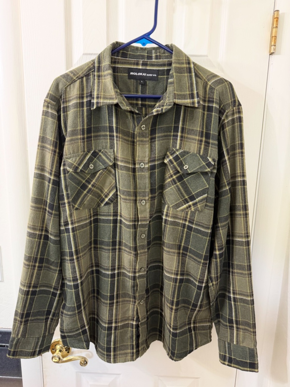 Green plaid flannel shirt from the Molokai Surf Co. Size Large